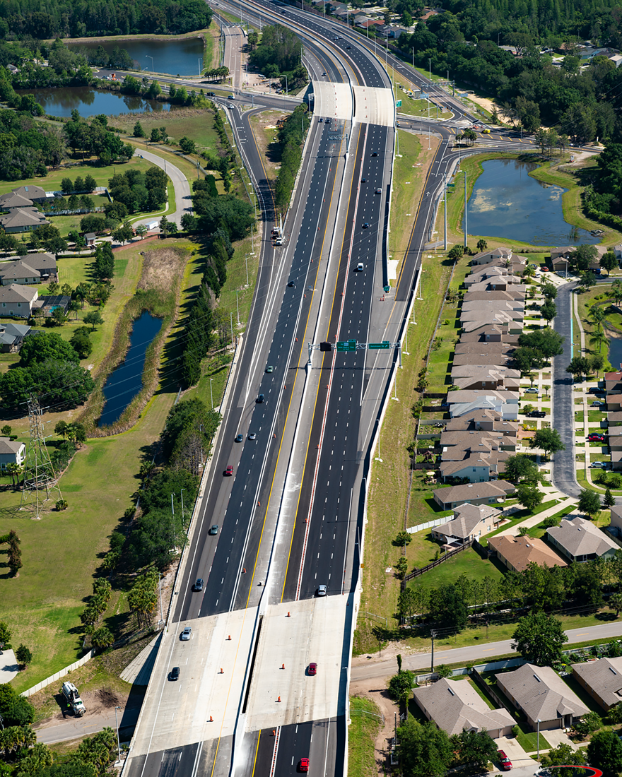 Aerial view of a highway with two level crossings